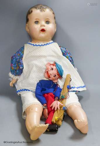 A Pelham puppet and a large Canadian composition doll, 59cm ...