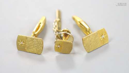 A pair of 9ct yellow gold and diamond-set cufflinks and a ma...