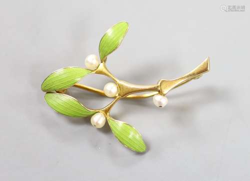 An Art Nouveau yellow metal, green enamel and seed pearl set...