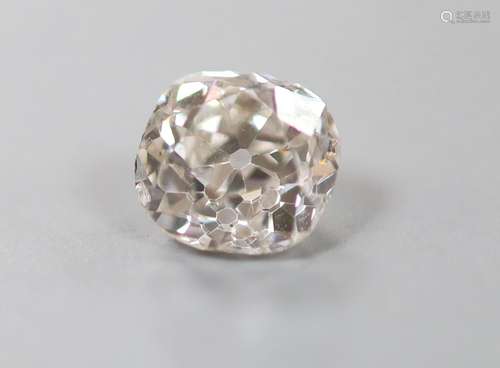 An unmounted cushion cut diamond, weighing approximately 1.1...