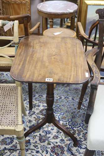 An early 19th century mahogany occasional table with rectang...