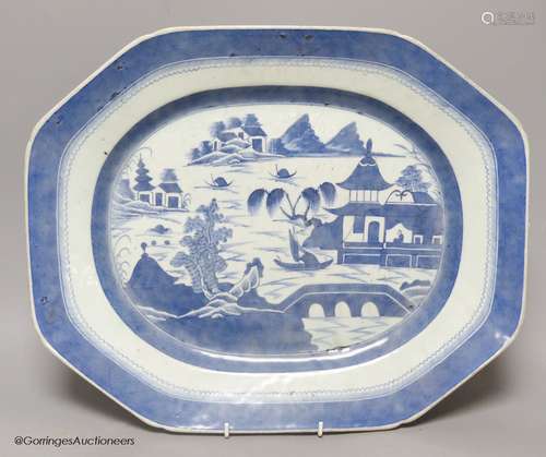 A 19th century Chinese export blue and white plate, decorate...