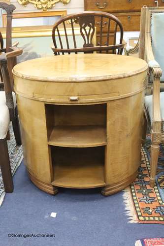 An Art Deco circular maple and bird's eye maple centre table...