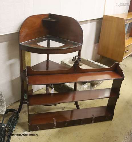 A George III mahogany two tier corner washstand, width 61cm,...