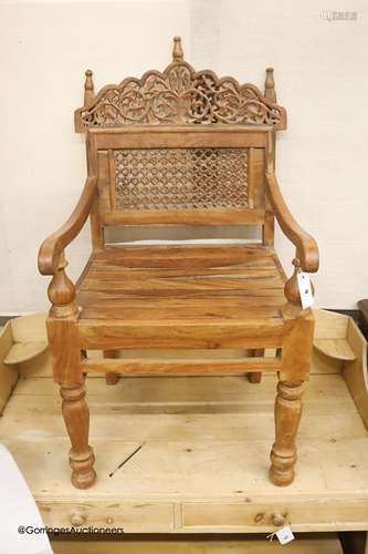 An Anglo-Indian carved hardwood elbow chair, width 55cm, dep...