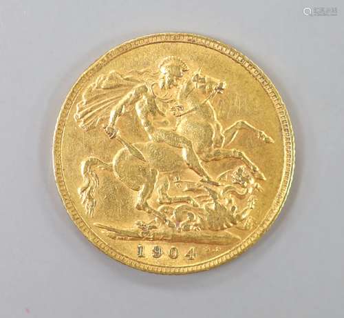 An Edward VII 1904 gold sovereign.