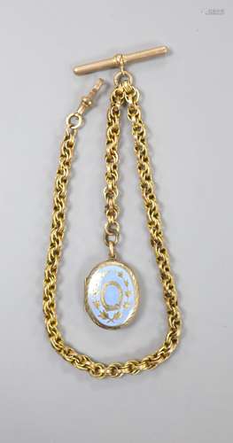 A Victorian gilt metal and enamel oval locket, 29mm, togethe...