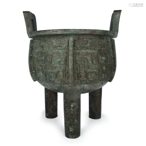 ARCHAIC BEAST MASK BRONZE RITUAL TRIPOD VESSEL