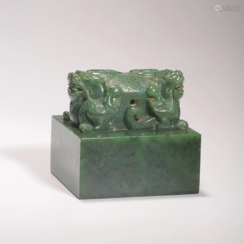 A CHINESE GREEN JADE SEAL