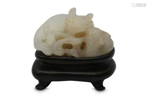 A CHINESE WHITE JADE 'CAT' GROUP.