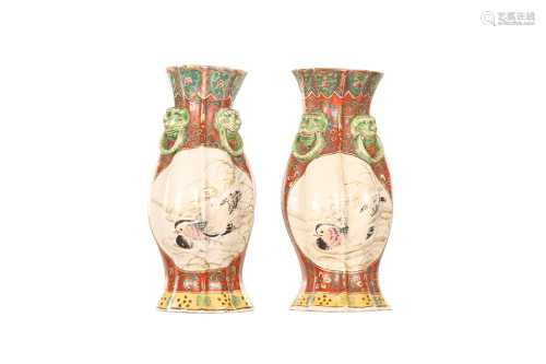 A PAIR OF FAMILLE ROSE WALL VASES.