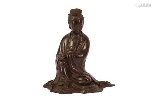 A CHINESE BRONZE FIGURE OF GUANYIN.