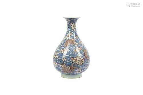 A CHINESE BLUE AND WHITE ANDUNDERGLAZE RED 'CARPS' BOTTLE VA...