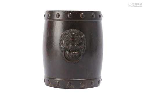 A CHINESE WOOD LION MASK BRUSH POT.