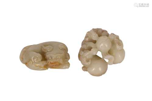 TWO CHINESE PALE CELADON JADE ANIMAL CARVINGS.