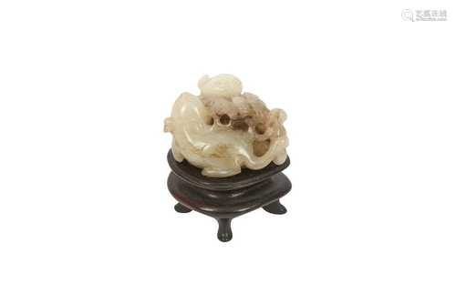 A CHINESE PALE CELADON JADE 'CATS AND BUTTERFLY' CARVING.