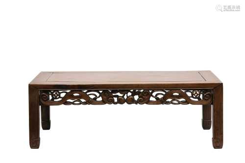 A CHINESE LOW WOOD TABLE.