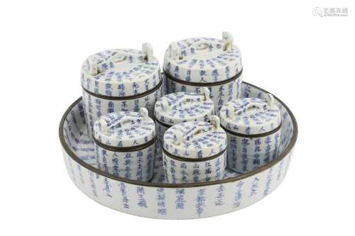 A CHINESE BLUE AND WHITE 'CALLIGRAPHY' TEA SET FOR THE THAI ...