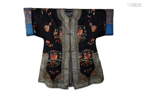 A CHINESE DARK BLUE-GROUND EMBROIDERED SILK LADY'S JACKET.