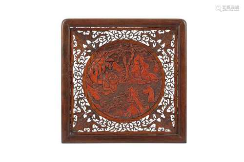 A CHINESE CIRCULAR CINNABAR LACQUER PANEL.