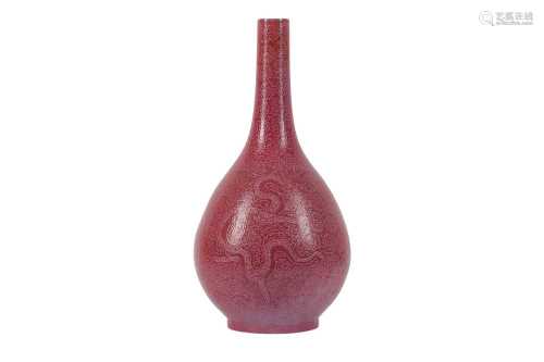 A CHINESE PINK-GROUND SGRAFFITO 'DRAGON' BOTTLE VASE.