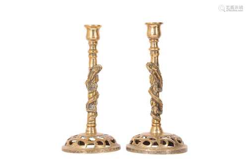 A PAIR OF CHINESE BRONZE 'DRAGON' CANDLESTICKS.