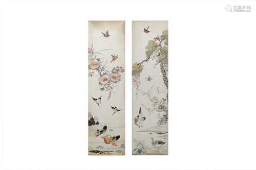 A PAIR OF CHINESE EMBROIDERED SILK 'BIRDS AND FLOWERS' PANEL...