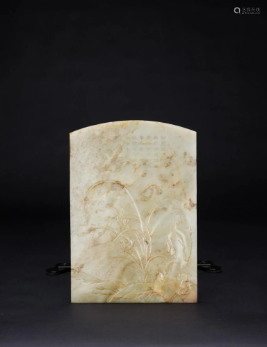 Qing- A White Jade Carved â€˜Orchid and Rockâ€™