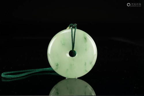 A Translucent Jadeite Disc Pendant