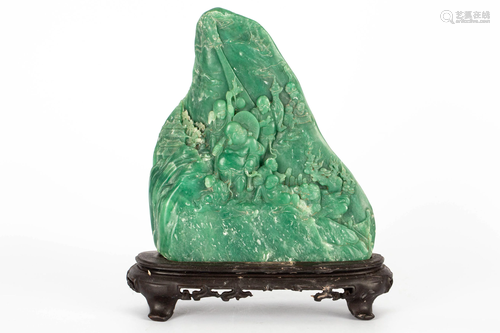 A CHINESE GREEN SHOUSHAN STONE ORNAMENT BY …