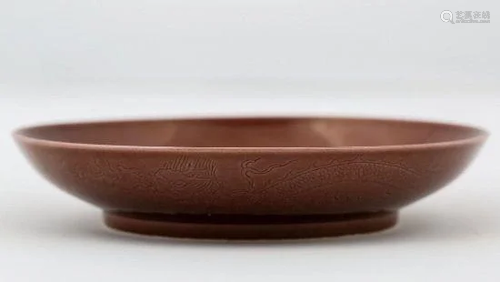 A RARE AUBERGINE GLAZED INCISED 'DRAGON' DISH