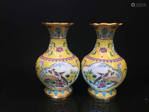 A pair of bronze vases with painted enamel flowers and birds