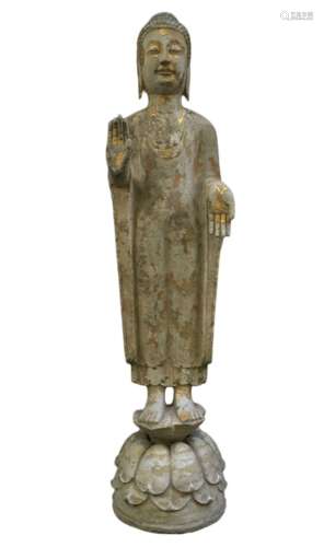 Limestone and gold-plated statue of Sakyamuni standing