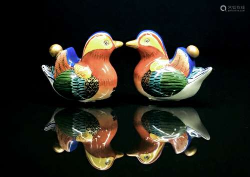 A pair of famille rose-shaped snuff bottles