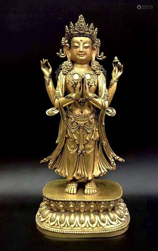 Gilt bronze statue of a four-armed Bodhisattva