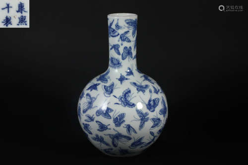 Blue and white butterfly pattern celestial vase in Qing Dyna...
