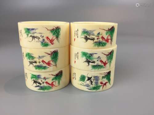 SIX CHINESE IVORY CRAVED AND PAINTED NAPKIN RING, 4.6CM X 2....