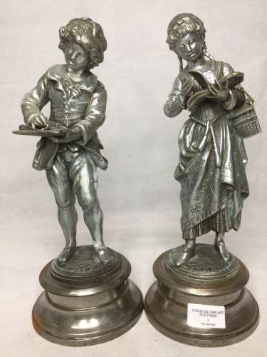 A PAIR OF 19TH CENTURY METAL STRIDING FIGURES, A YOUNG SCRIB...