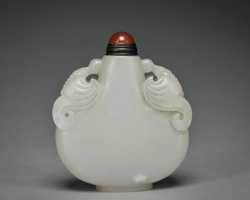 A Carved White Jade Snuff Bottle