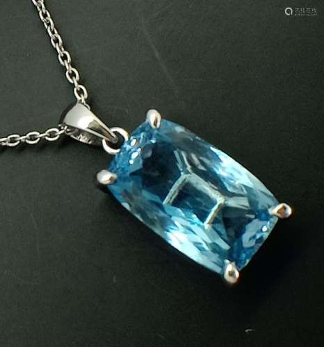 925 rhodium silver pendant with blue topaz