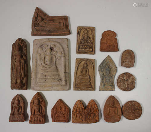 A group of fifteen Thai pottery votive plaques/tablets, vari...