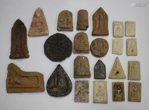 A group of twenty-two Thai pottery votive plaques/tablets, v...