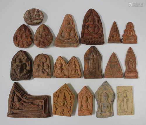 A group of eighteen Thai pottery votive plaques/tablets, var...