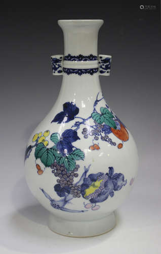 A Chinese doucai porcelain bottle vase, painted in underglaz...