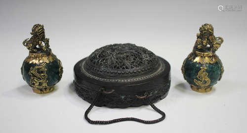 A pair of Chinese gilt metal and green hardstone scroll weig...