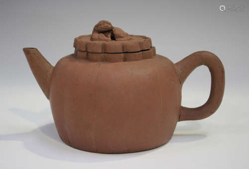 A Chinese Yixing stoneware teapot, late Qing dynasty, the co...