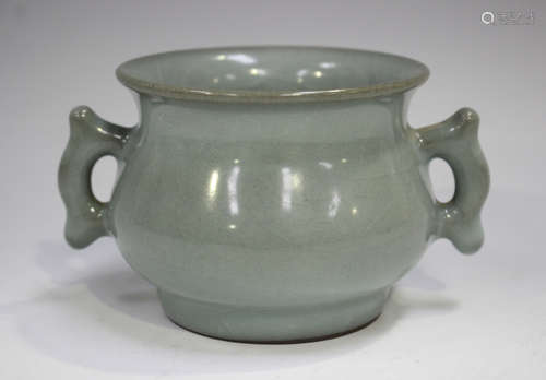 A Chinese celadon glazed censer of circular bombé form with ...