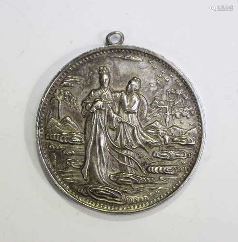 A Chinese silver medal, one side cast with a maiden and atte...