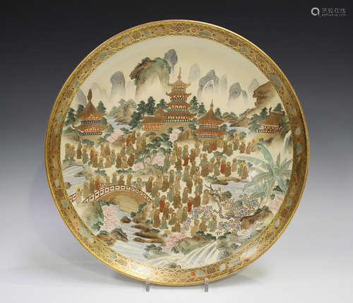 A Japanese Satsuma earthenware circular dish by Kitamura, Me...