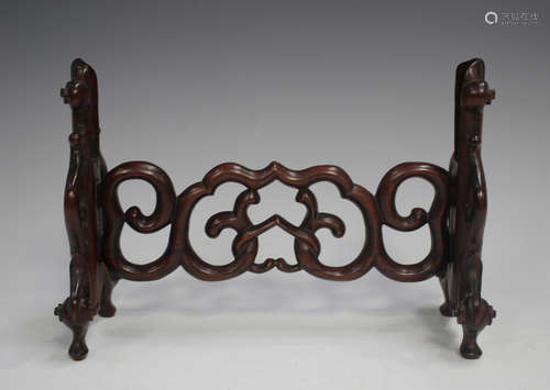 A Chinese hardwood table screen stand, late Qing dynasty, ca...